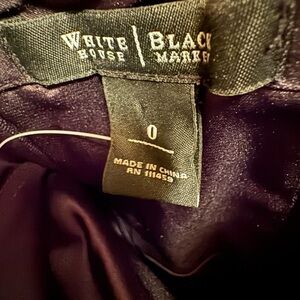 White House Black Market dress, never worn.  Strapless black fits well!